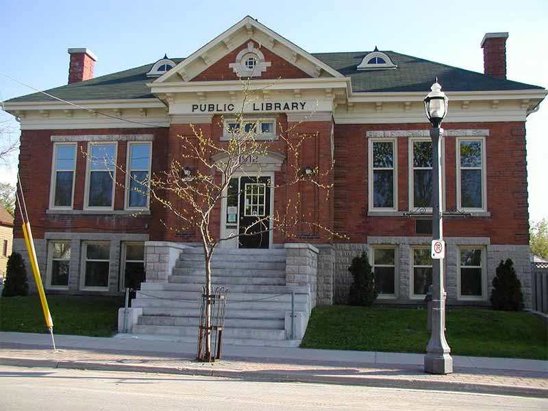 A library with steps out the front of the building